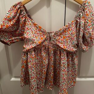 Floral pattern puff short sleeve top low cut